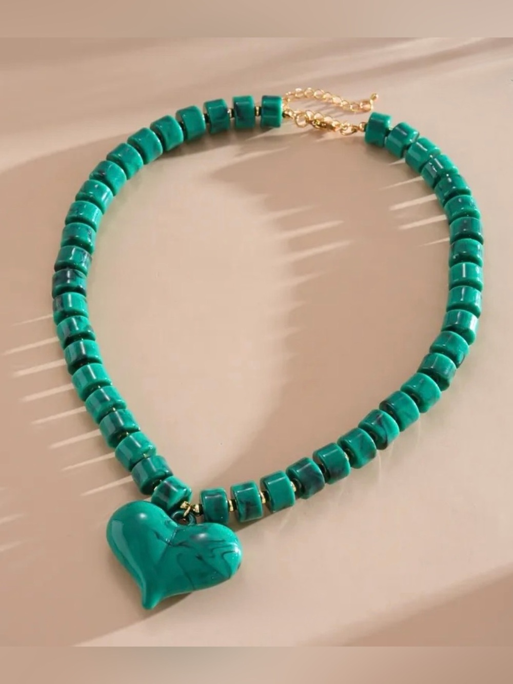 Anthropologie Green Heart Bead Pendant
Green Necklace - Picture 7 of 9